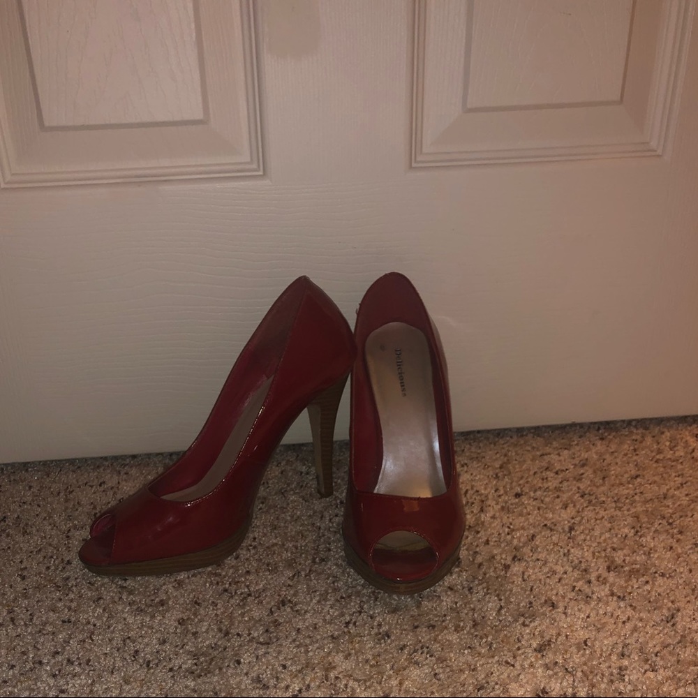 Red peep toe pumps